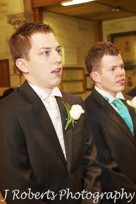 Groom looking amazed as bride walks down the aisle - wedding photography sydney